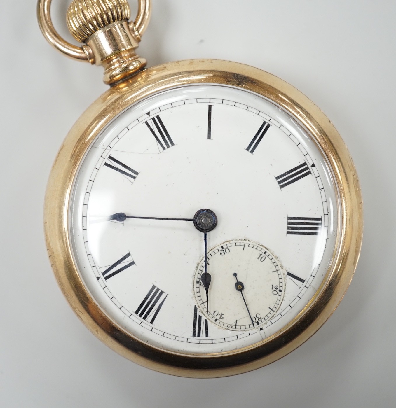 An American gold plated Rockford Watch Co. keyless open faced pocket watch, with Roman dial and subsidiary seconds, the case back engraved with a horse.